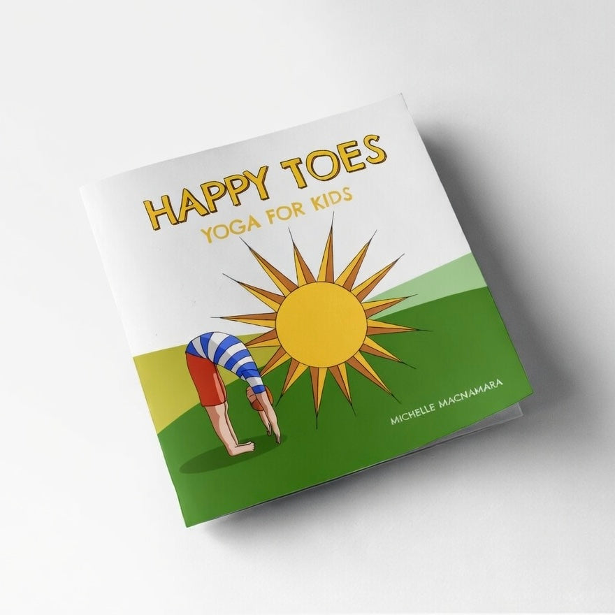 Book titled 'Happy Toes: Yoga for Kids' with a sun illustration on a white background