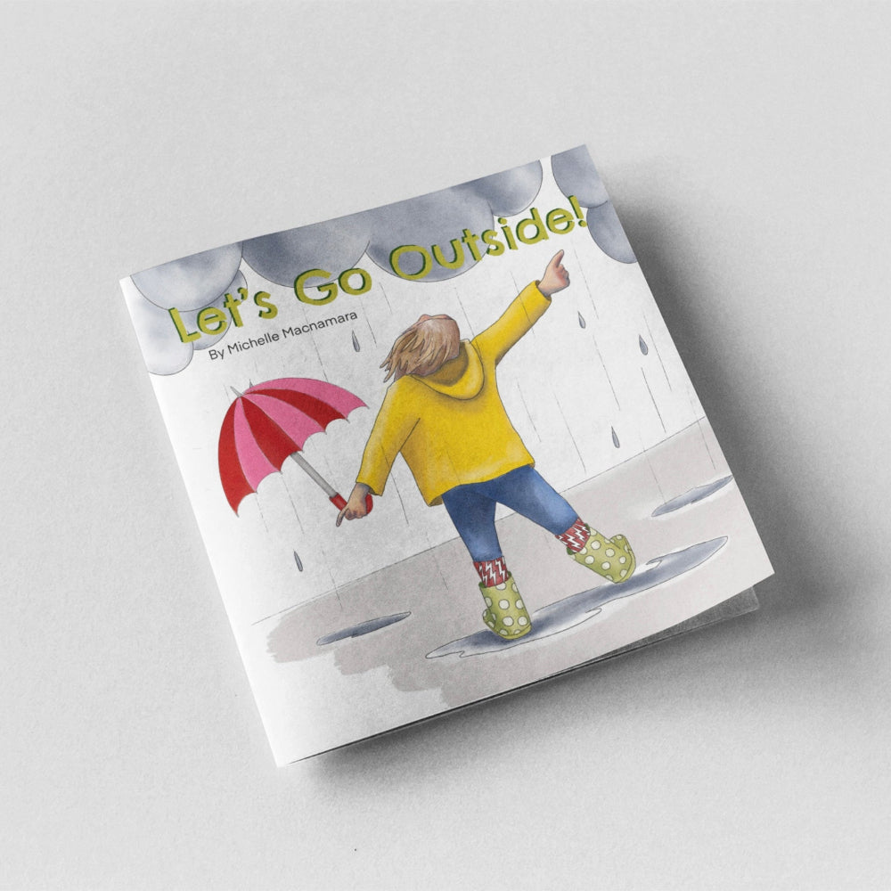 Book titled 'Let's Go Outside!' with a child in a yellow coat on the cover against a light gray background
