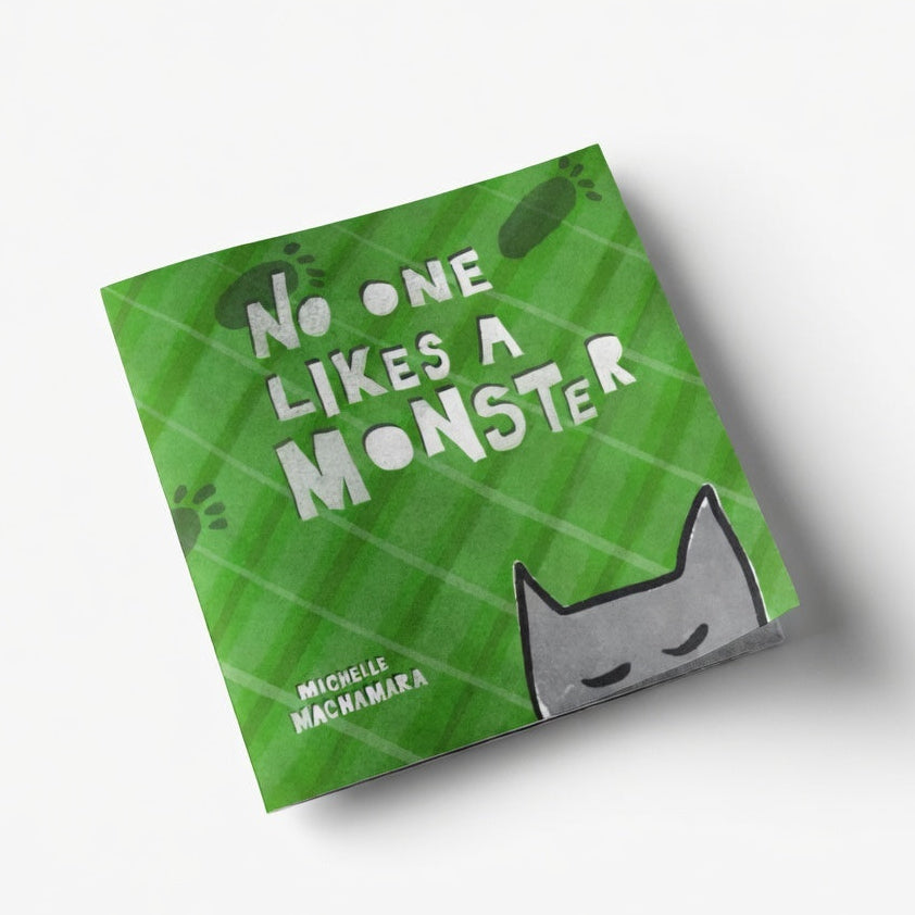 Green book cover with text 'No one likes a monster' and a cat illustration on a white background